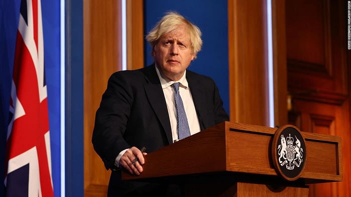 Boris Johnson: Photo appears to show British PM drinking wine with Downing Street staff during coronavirus lockdown - CNN